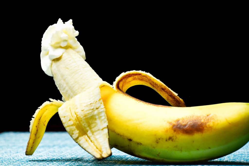 yellow banana fruit with white flower